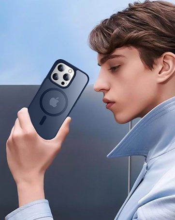 A man holding an iPhone in a navy SPIDERCASE matte case